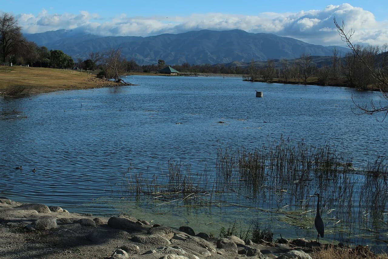 Still lake water and mountain views at Prado Regional Park in Chino